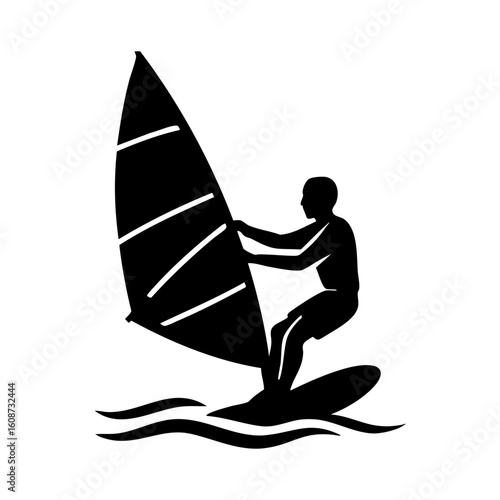 Silhouette of windsurfer balancing on water