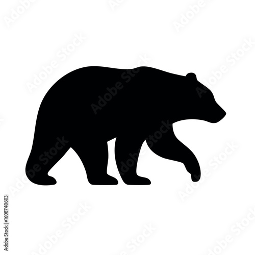 Bold black bear silhouette walking in profile. Simple vector graphic icon of a wild animal with a lifted paw.