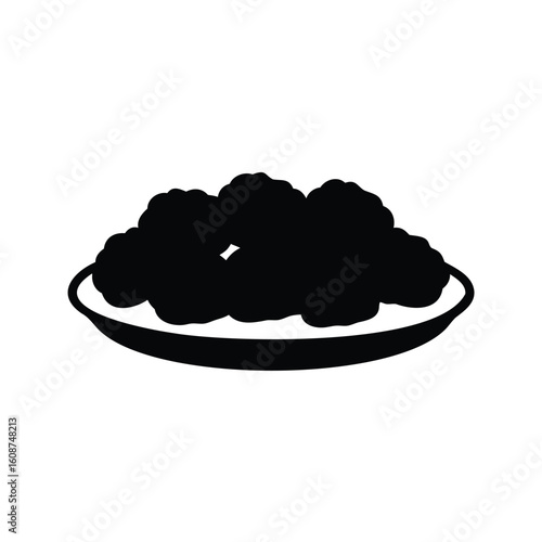 Silhouette of a plate filled with cauliflower florets or similar food
