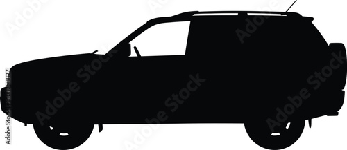Silhouette of a Four Door Sport Utility Vehicle with Roof Rack and Rear Mounted Spare Tire
