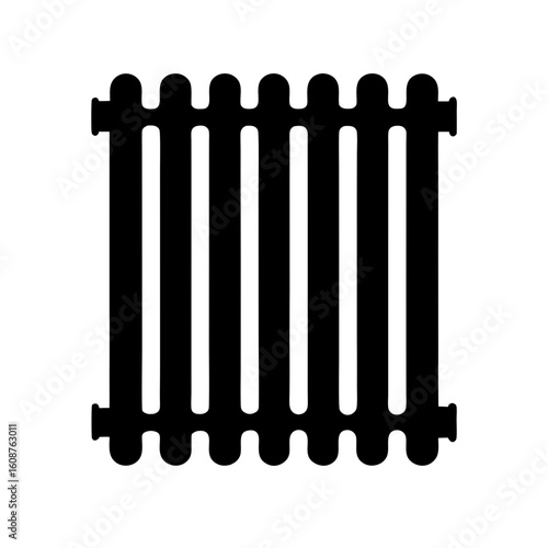 Silhouette of a black cast iron radiator used for heating a building