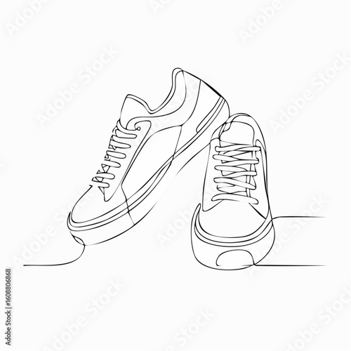 Single one line drawing a pair of sneakers. Trendy canvas shoes in vibrant colors