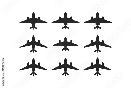 A collection of airplane silhouettes isolated on white background, representing various aircraft designs for aviation and travel themes