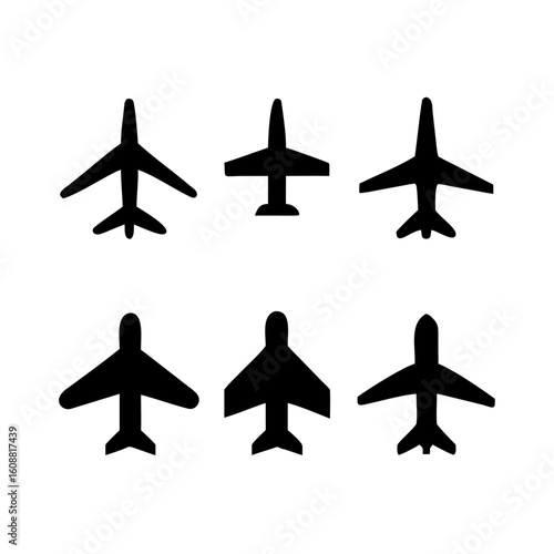 A set of six airplane silhouettes isolated on white background represents different types of aircraft