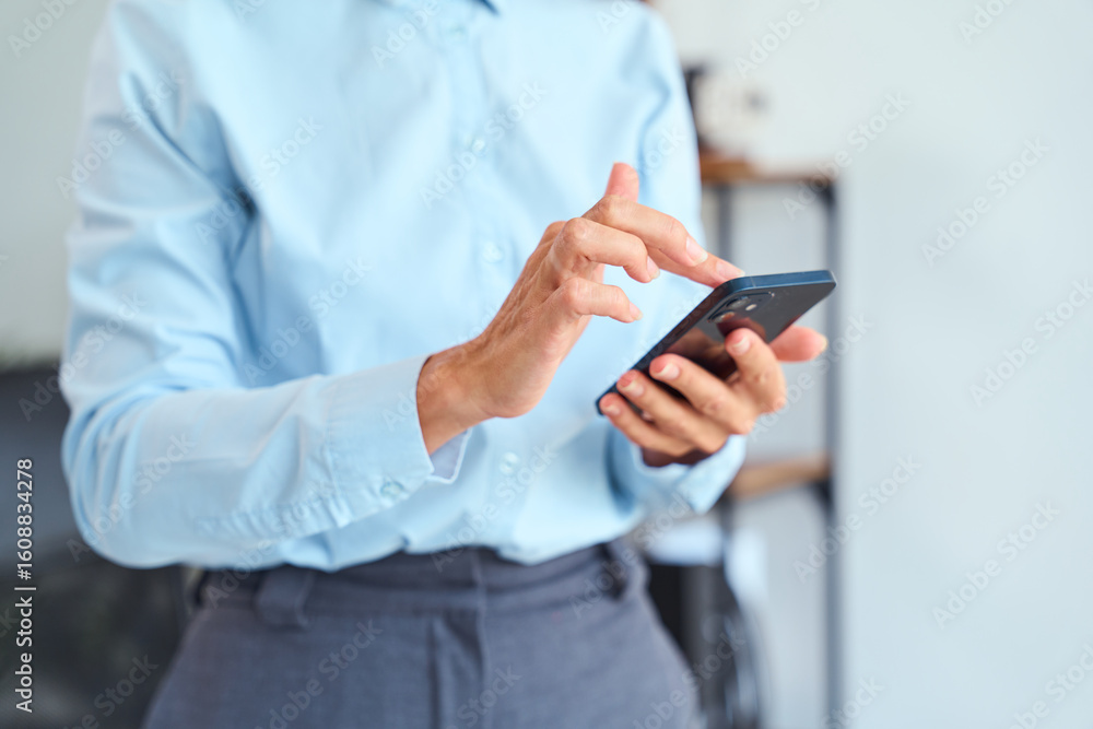 Professional Showing a Businessperson’s Hands Using a Mobile Phone, Displaying Communication, Technology, and Professionalism in a Modern Office Setting Professional Showing a Businessperson’s Hands Using a Mobile Phone, Displaying Communication, Technology, and Professionalism in a Modern Office Setting