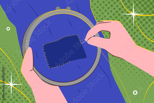 Hands stitching a patch onto fabric using a needle and embroidery hoop for repair.