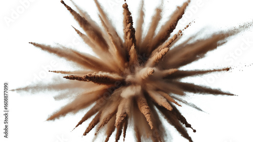 An explosion of brown powder against a white background creating a radial burst effect in the center