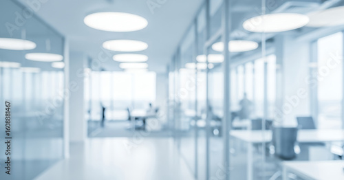 Spacious business interior captured with soft focus, emphasizing architectural clarity, minimalist design, and a clean work environment.