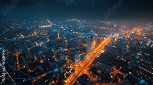 Aerial View of Futuristic Smart City with Digital Light Grid at Night