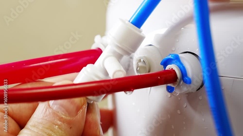 Installing water filter tees for efficient plumbing connections