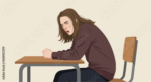 Distracted schoolchild sitting at desk looking frustrated in classroom  