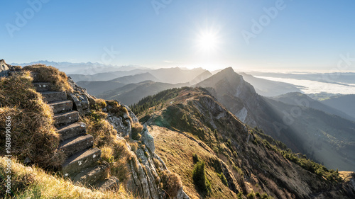Stairway to heaven. On the summit of Mittaggüpfi mountain, with views over the Napf mountains and the Bernese Oberland. Switzerland.