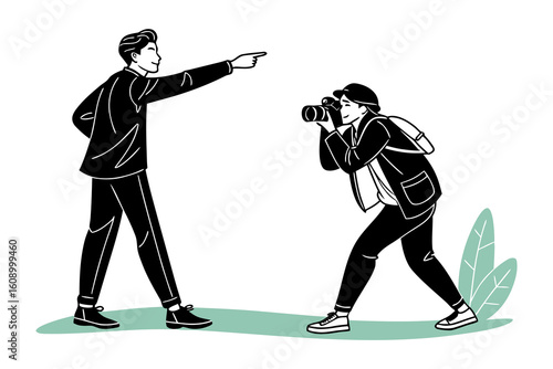 A confident man in a suit directs a photographer holding a camera capturing a moment of artistic collaboration and creative direction