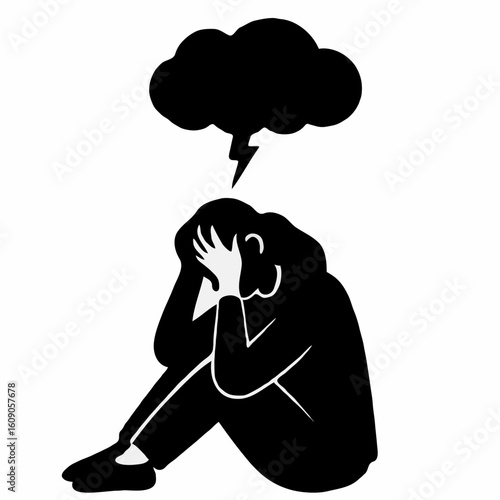 Individual sitting on the floor with hands on face in distress  