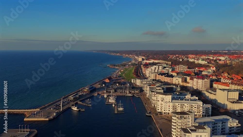 Scenic aerial view of Helsingborg coastline with promenade marina and residential buildings on a clear sunny day in southern Sweden 