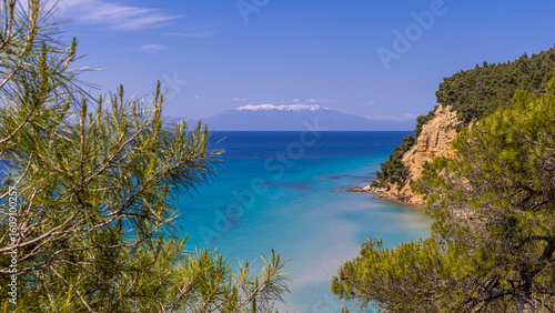 View of Mount Olympus over turquoise waters near Sani, Chalkidiki