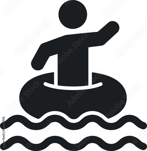 Person floating on inflatable ring in water