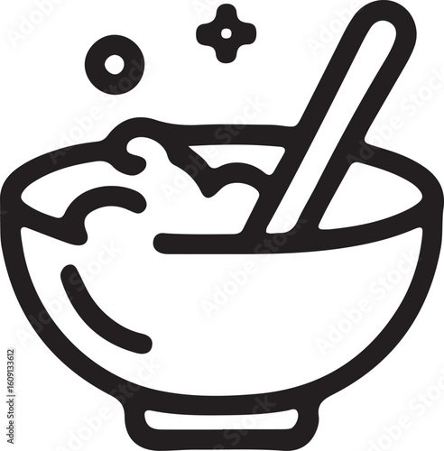 Bowl with spoon and bubbly liquid bubbles stirring