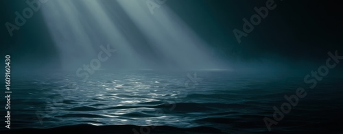 The serene beauty of water illuminated by mystical light rays.