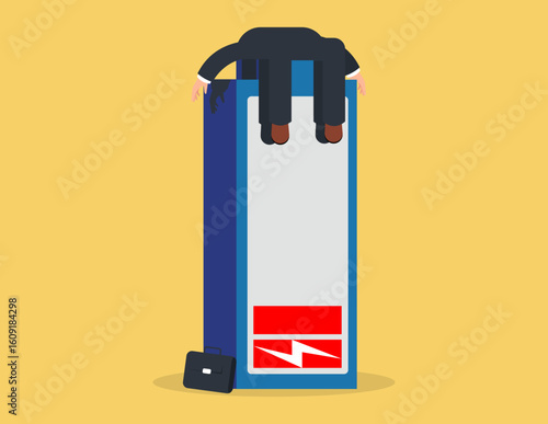 Need to charge energy power. Fatigued businessman feeling burnout and energy depletion in the workplace