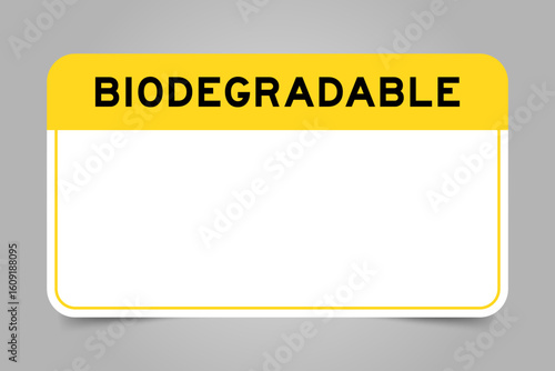 Label banner that have yellow headline with word biodegradable and white copy space, on gray background
