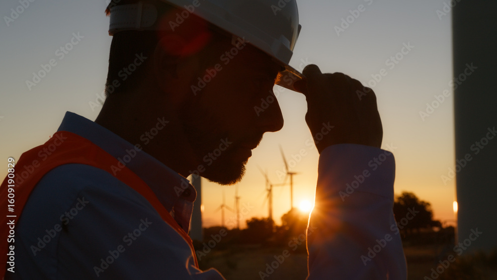 Fototapeta premium Technician Men Putting The Helmet 