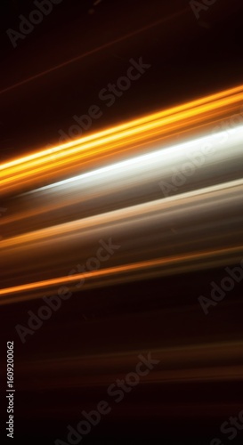 Dynamic light trails depicting abstract motion and high speed energy, creating a captivating visual display.
