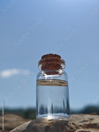 Small transparent bottle