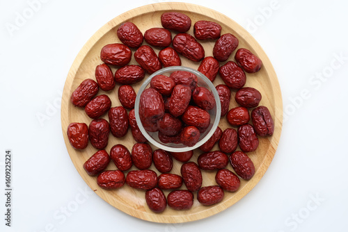Fotografi Top view Natural sweet dried jujube in a glass cup. Healthy fruit