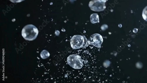 Wallpaper Mural Floating water droplets on black Torontodigital.ca