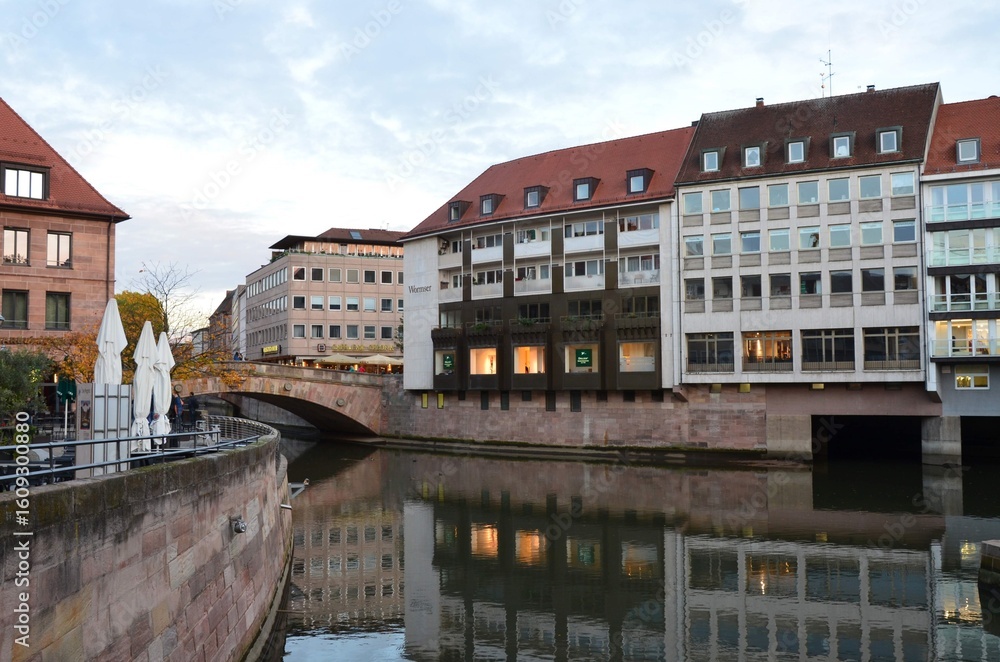 Fototapeta premium Nuremberg, Germany 10.16.2019: The River Pegnitz in Nuremberg from the Trödelmarkt IslandNuremberg, Germany 10.16.2019: The River Pegnitz in Nuremberg from the Trödelmarkt Island