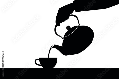 Silhouette of a hand pouring tea from a teapot into a cup