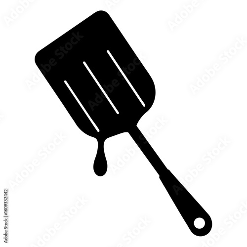 Black silhouette of a slotted spatula on a white background