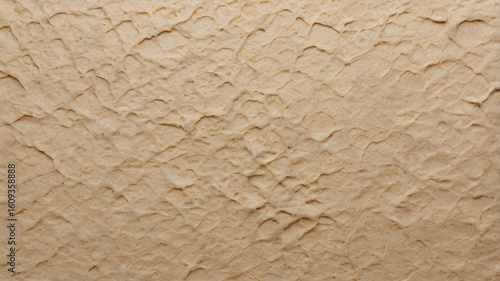 Beige sandstone wall texture seamless. Seamless close-up of natural sandstone texture in beige tones, perfect for architectural and design mockups.