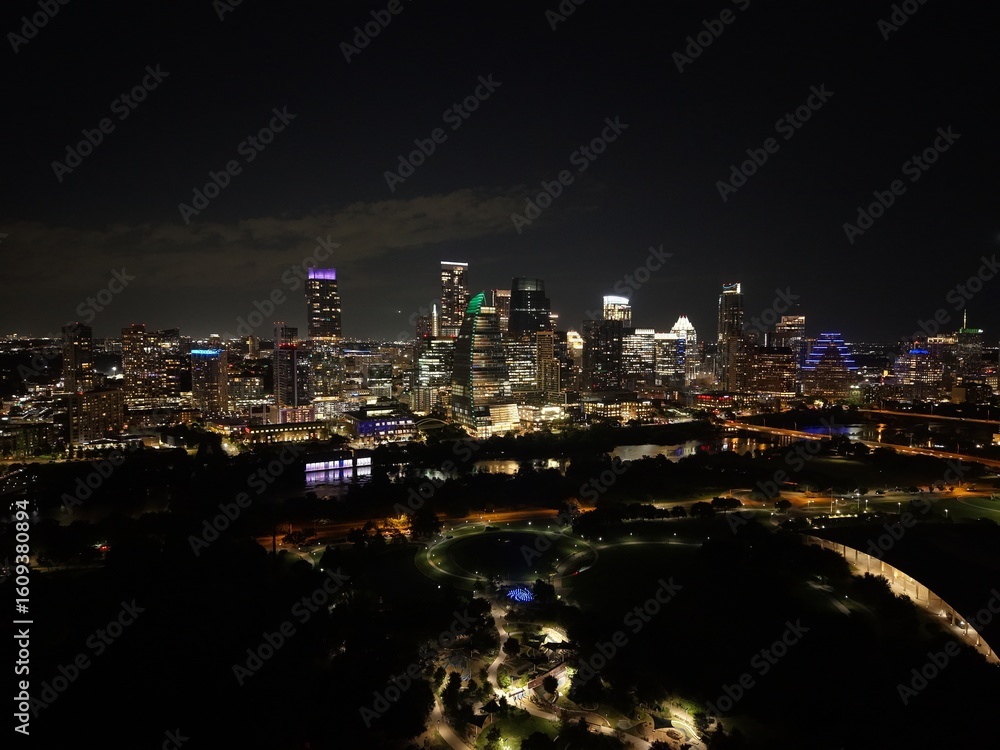 Fototapeta premium Beautiful Austin skyline at night with a stunning aerial drone view