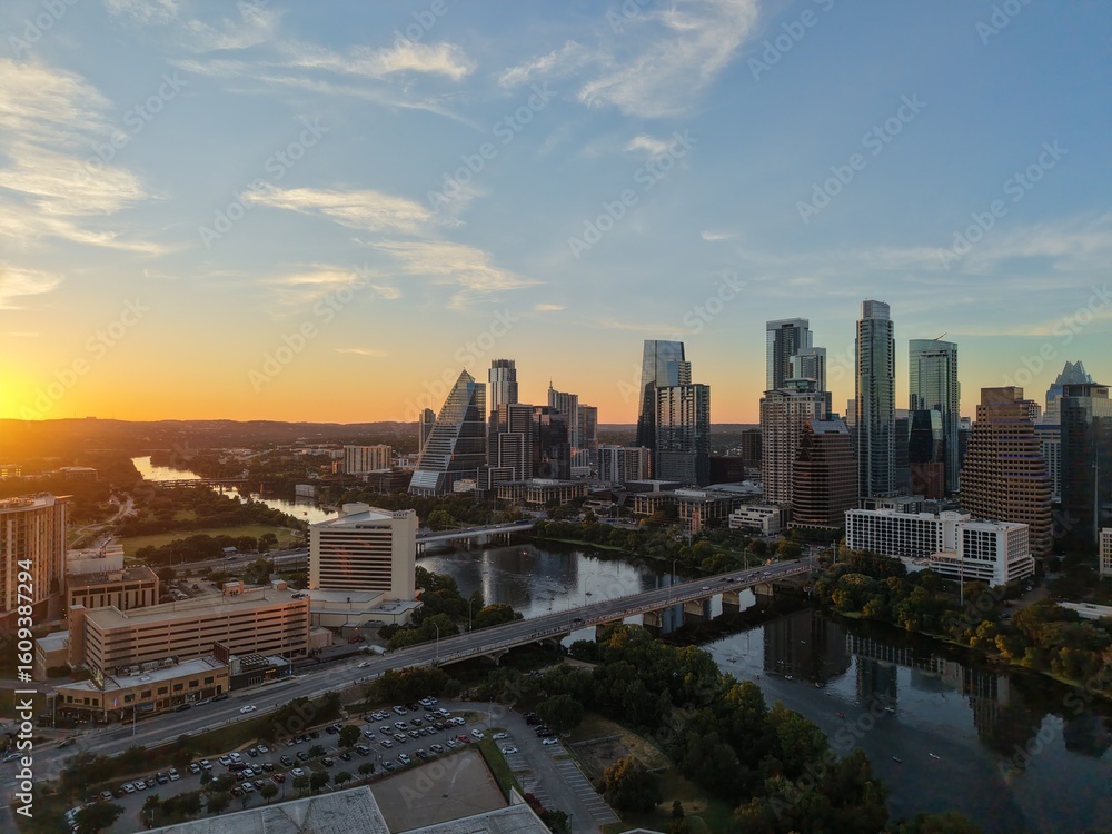 Fototapeta premium Beautiful Austin skyline during sunset with a stunning aerial drone view 