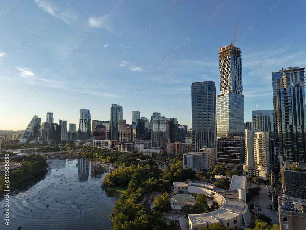 Obraz premium Beautiful Austin skyline during sunset with a stunning aerial drone view