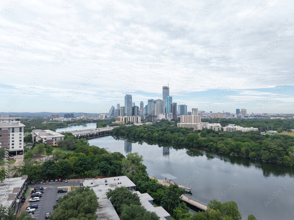 Fototapeta premium Austin's beautiful morning skyline from a unique aerial drone perspective on a cloudy day