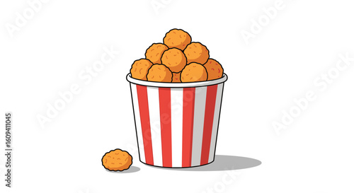 A tall bucket filled with many crunchy fried chicken bites ready for enjoyment