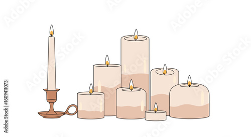 A collection of lit pillar candles and taper candle in a candlestick holder