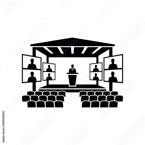 Speaker at podium with audience and video screens showing people conference presentation