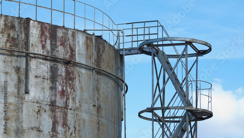 fuel storage tank against blue sky close up