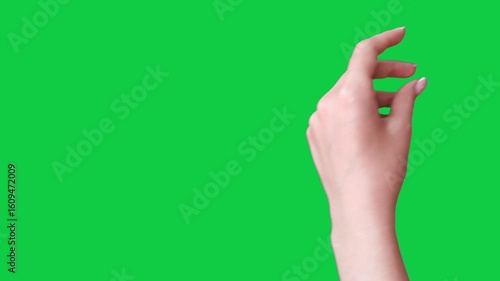 Woman hand finger snapping, give money gesture, green screen prores footage. Female hand snapping fingers, snap fingers gesture isolated on green screen.