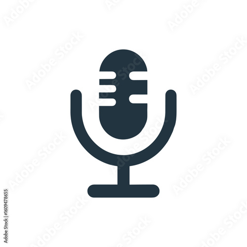 Vintage microphone on a stand, symbolizing music and audio recording, against a plain background