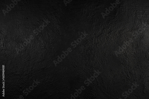 Photos Dark textured black surface with subtle roughness for background or design use