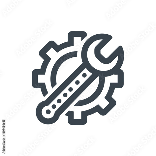 Iconic representation of mechanical tools with a wrench and gear symbolizing engineering and repair