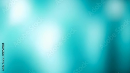 An image displays a blurred, smooth gradient transitions between lighter and darker shades of blue, creating a serene and calming visual texture