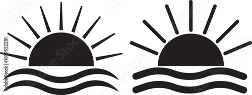 Two identical suns rising over waves silhouette