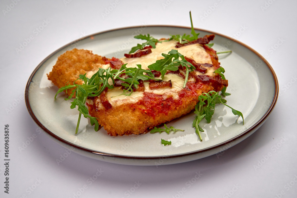 A Deliciously Crispy Dish Featuring Melted Cheese, Savory Toppings, and Fresh Greens, Perfectly Plated on a Round White Dish, Ideal for Any Meal. A Deliciously Crispy Dish Featuring Melted Cheese, Savory Toppings, and Fresh Greens, Perfectly Plated on a Round White Dish, Ideal for Any Meal.