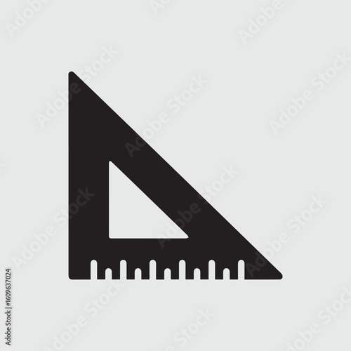Black silhouette of a triangular ruler with measurement markings on a light gray background